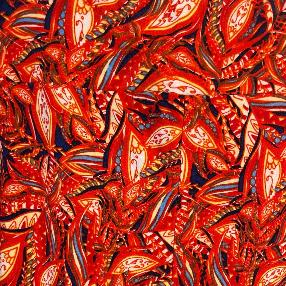 20% off 3+ items. Red fiery paisley leggings in Tall & Curvy. NEVER WORN!